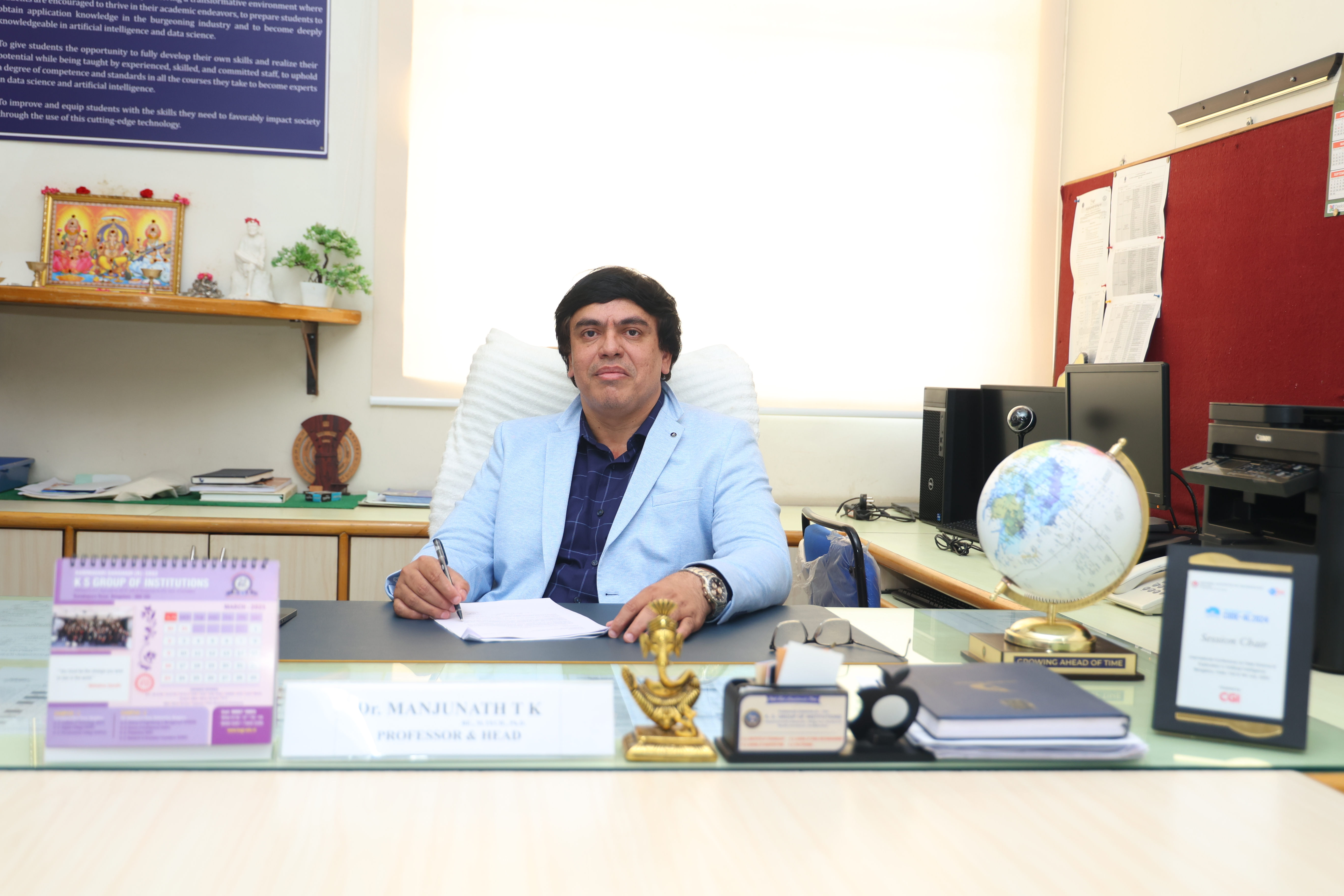 Dr. Manjunath T K